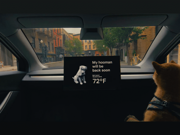 A dog sitting in a Tesla Robotaxi